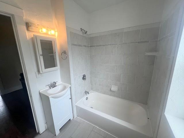 358 Pointview Road Pittsburgh, PA 15227 - Photo 12 of 12 a bathroom with a bathtub a window and a shower