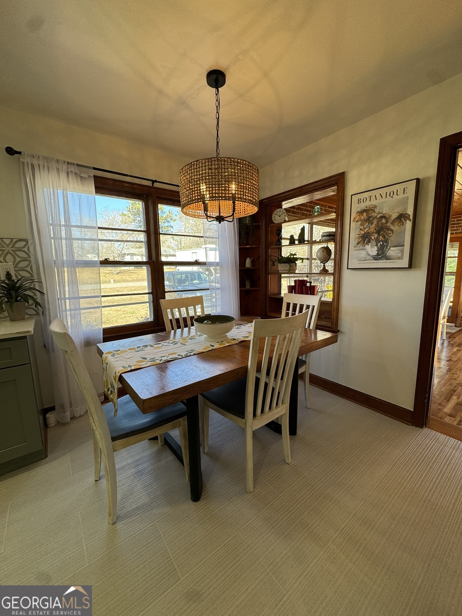 410 Sunset Circle Forsyth, GA 31029 - Photo 20 of 27 a dining room with furniture and window