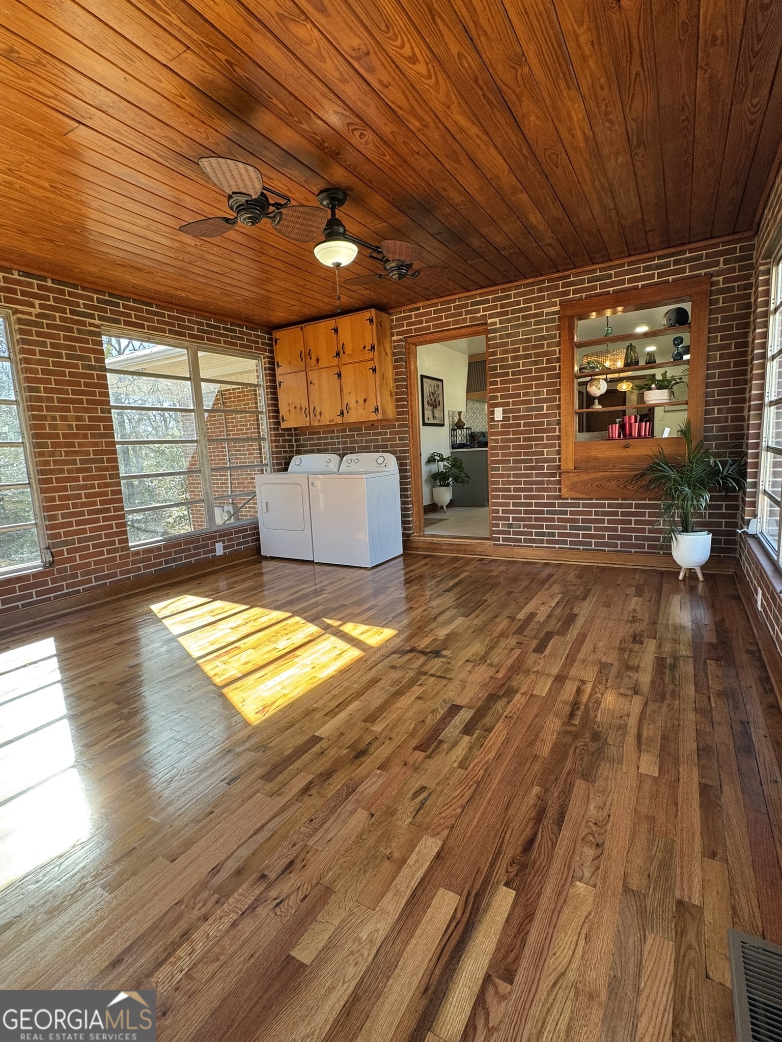 410 Sunset Circle Forsyth, GA 31029 - Photo 24 of 27 a view of a livingroom with wooden floor