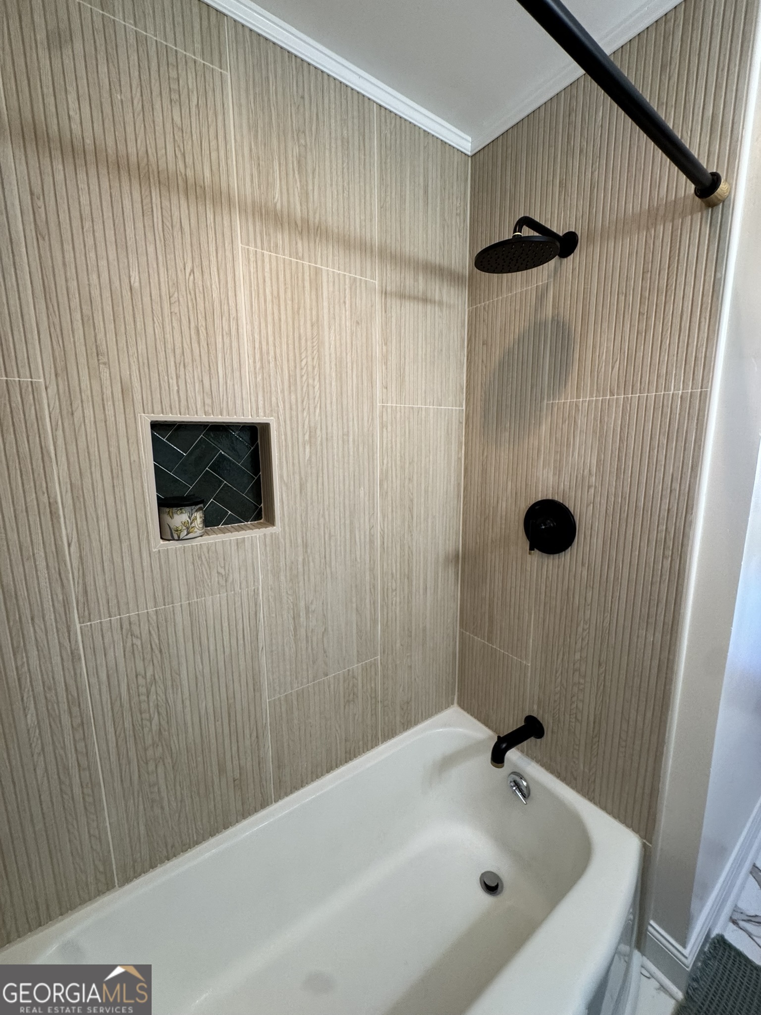 410 Sunset Circle Forsyth, GA 31029 - Photo 7 of 27 a bathroom with a shower and a sink