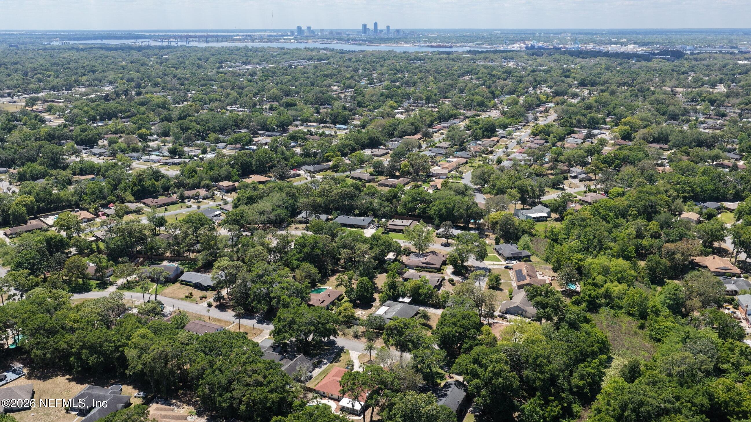3371 Debussy Road Jacksonville, FL 32277 - Photo 11 of 21 DJI_20260423140225_0017_D
