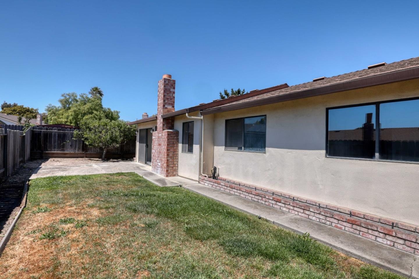 13 Victor Circle Salinas, CA 93907 - Photo 4 of 18 a view of a house with backyard and a tree