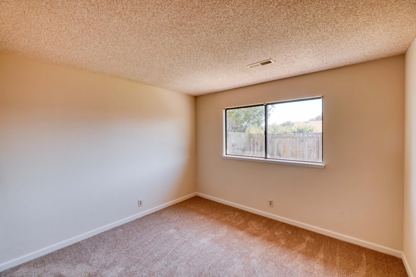 13 Victor Circle Salinas, CA 93907 - Photo 8 of 18 an empty room with windows