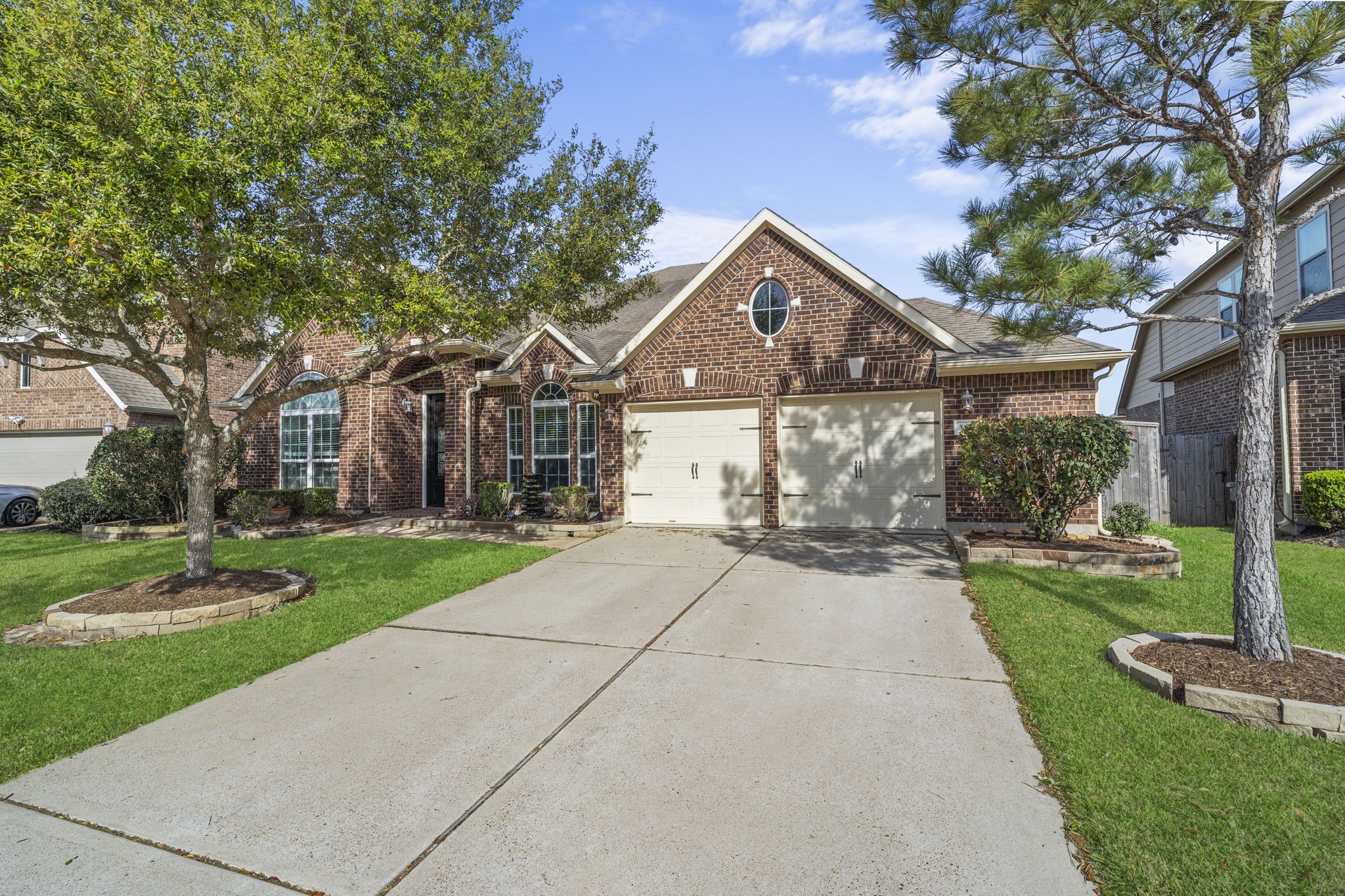 3426 Summer Ranch Drive Katy, TX 77494 - Photo 38 of 48 A wide driveway, classic brick exterior, and welcoming front entry combine to create a timeless look with plenty of space for everyday living and guest parking.