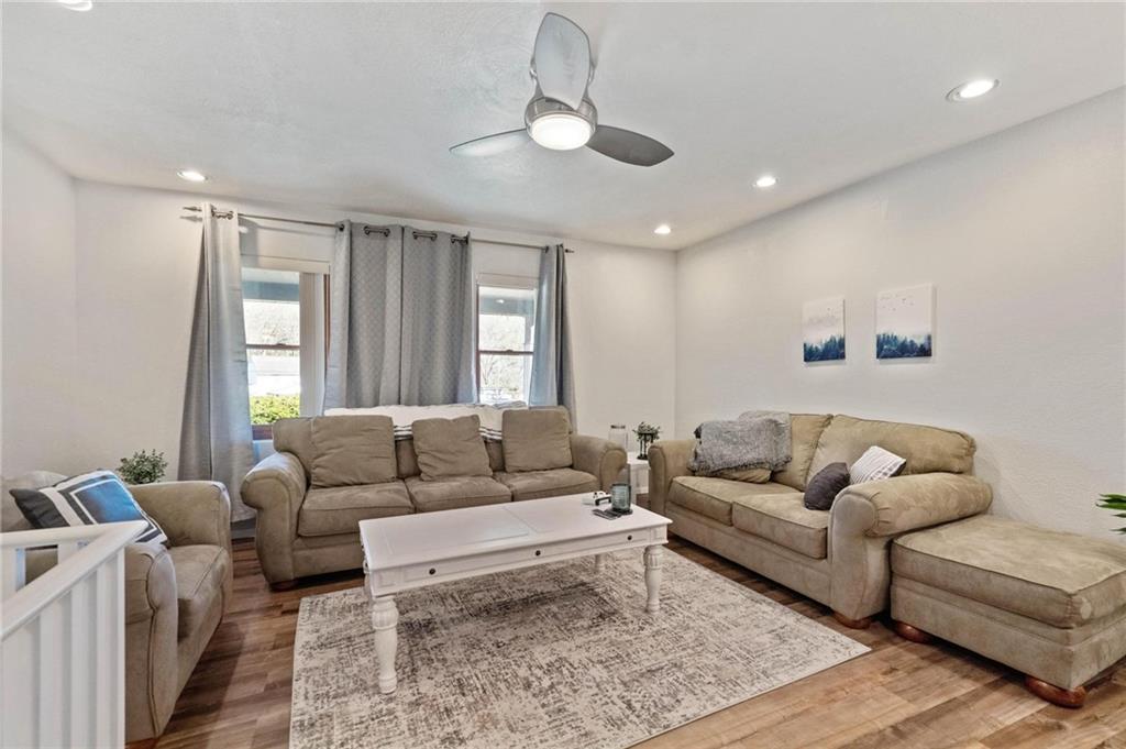134 Wilson Avenue Cecil, PA 15321 - Photo 12 of 25 a living room with furniture and a chandelier