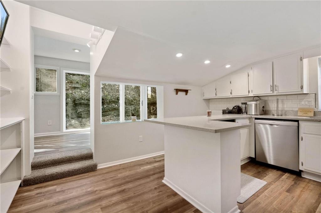 134 Wilson Avenue Cecil, PA 15321 - Photo 16 of 25 a kitchen with granite countertop white cabinets and white appliances