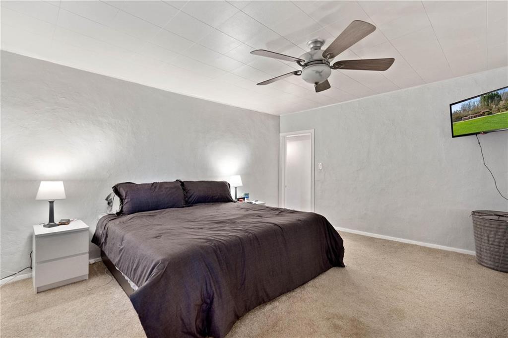 134 Wilson Avenue Cecil, PA 15321 - Photo 23 of 25 a bedroom with a bed and window