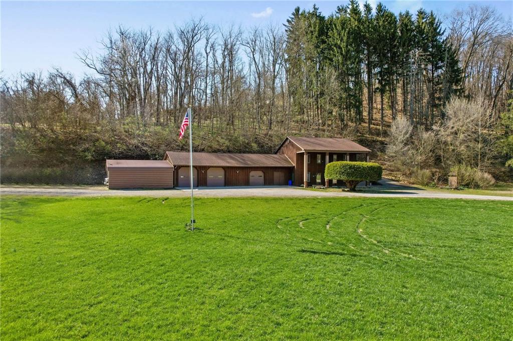 134 Wilson Avenue Cecil, PA 15321 - Photo 3 of 25 a view of house with a yard