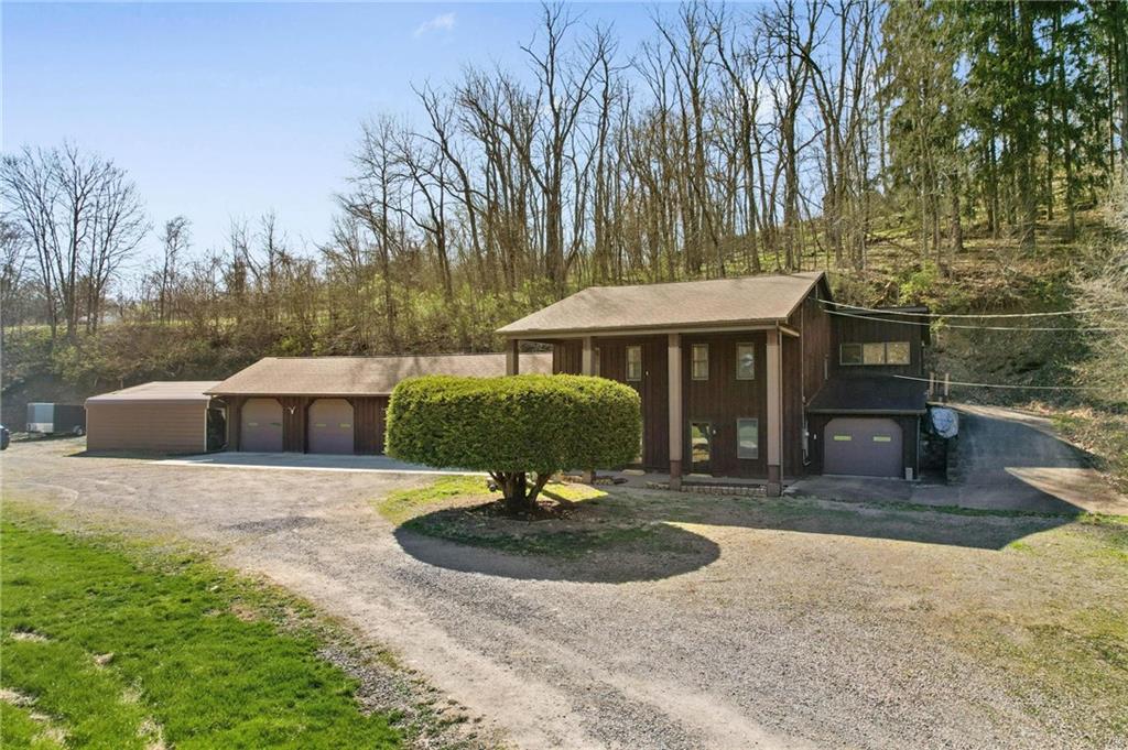 134 Wilson Avenue Cecil, PA 15321 - Photo 4 of 25 a front view of a house with garden