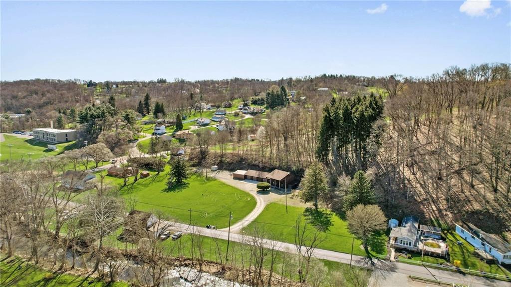134 Wilson Avenue Cecil, PA 15321 - Photo 5 of 25 an aerial view of residential houses with outdoor space and trees