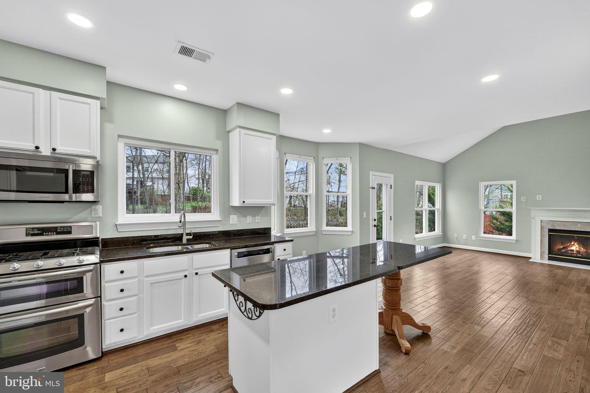 42943 Gotham Way Ashburn, VA 20147 - Photo 16 of 53 Kitchen opens to family room