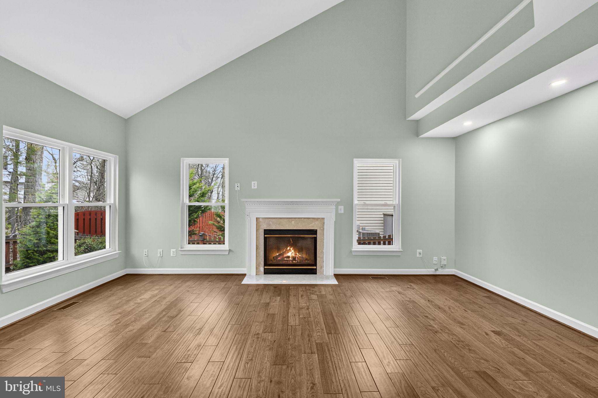 42943 Gotham Way Ashburn, VA 20147 - Photo 21 of 53 Family room features a cozy fireplace