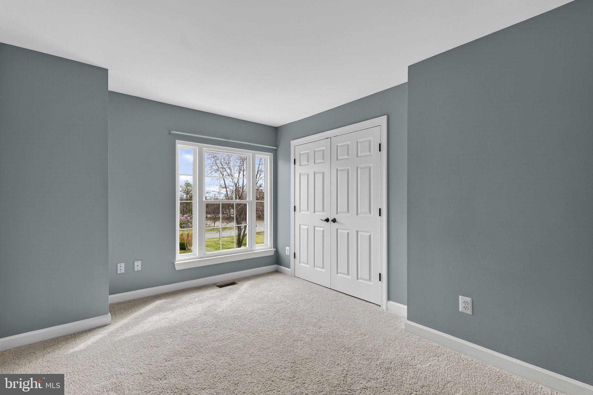 42943 Gotham Way Ashburn, VA 20147 - Photo 30 of 53 Bedroom two with plenty of natural light