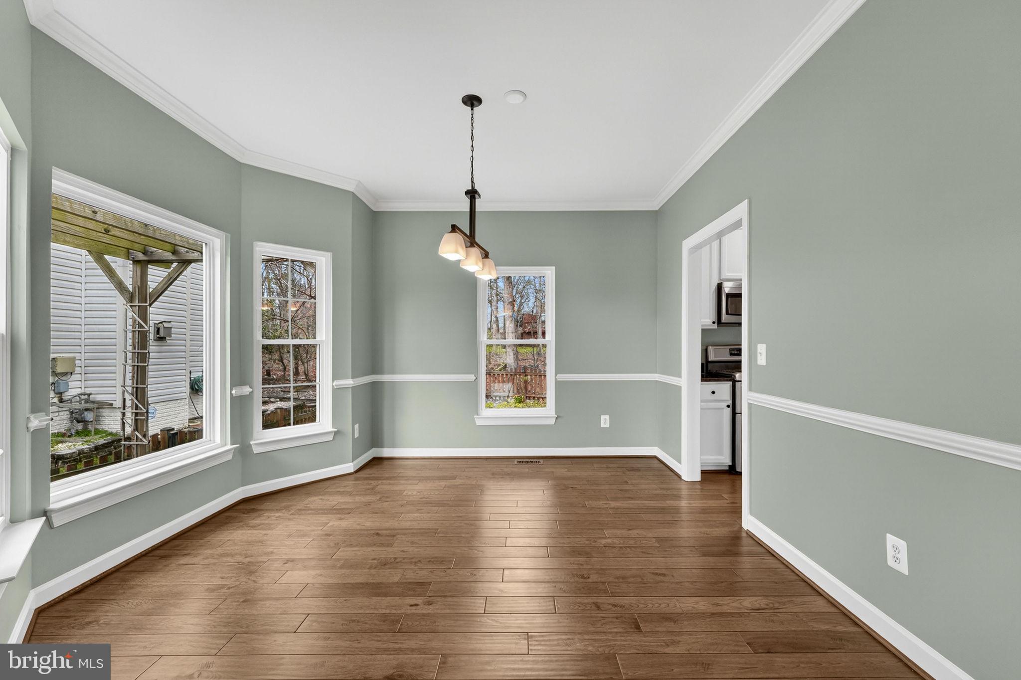 42943 Gotham Way Ashburn, VA 20147 - Photo 9 of 53 Dining room with bay window