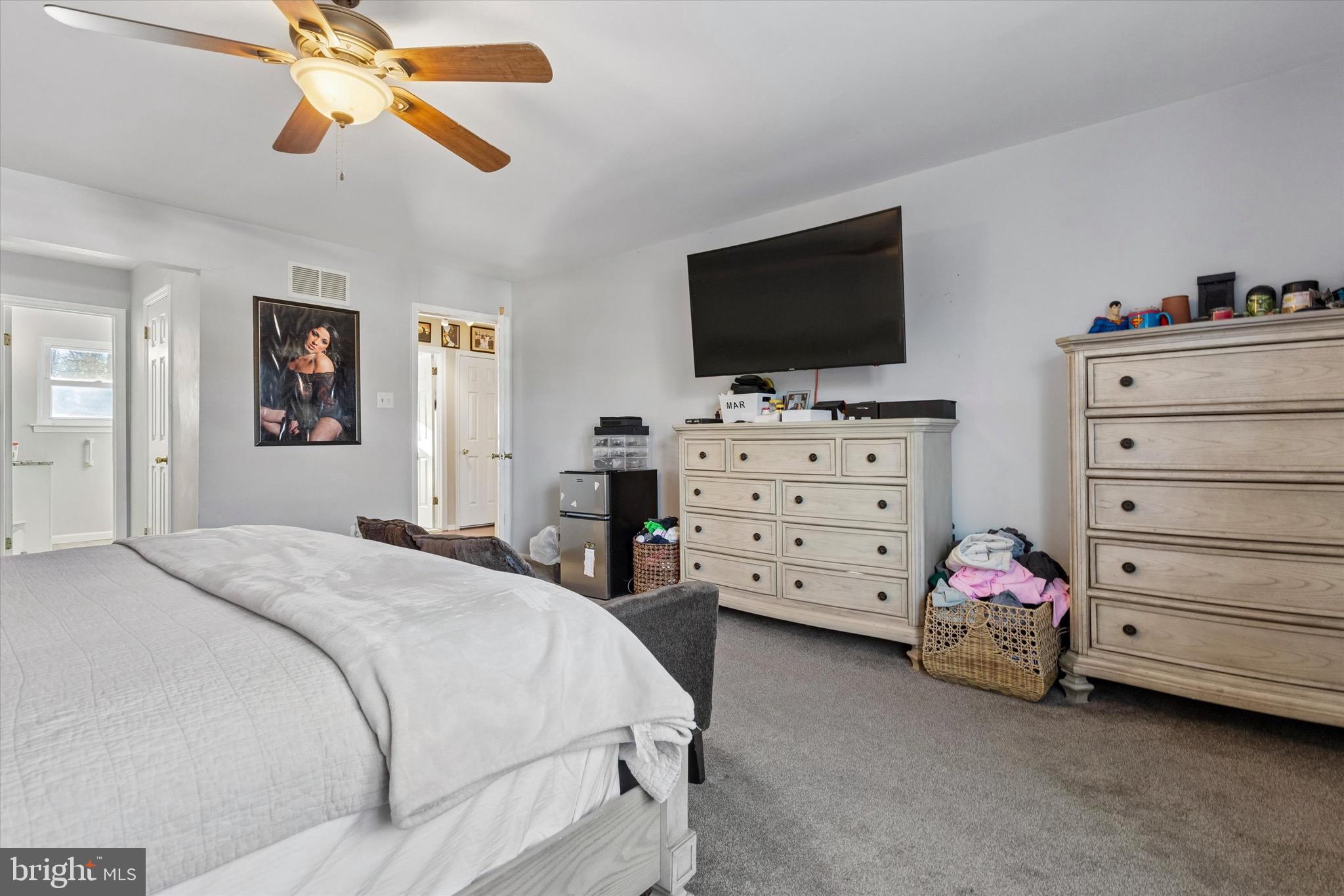 1126 Plowshare Road Blue Bell, PA 19422 - Photo 17 of 30 a bedroom with a bed and flat screen tv