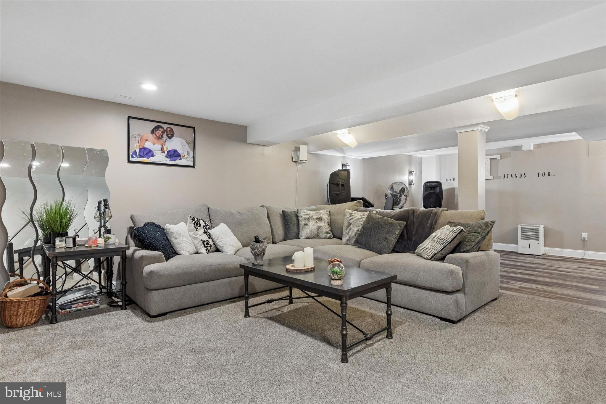 1126 Plowshare Road Blue Bell, PA 19422 - Photo 20 of 30 a living room with furniture and a potted plant