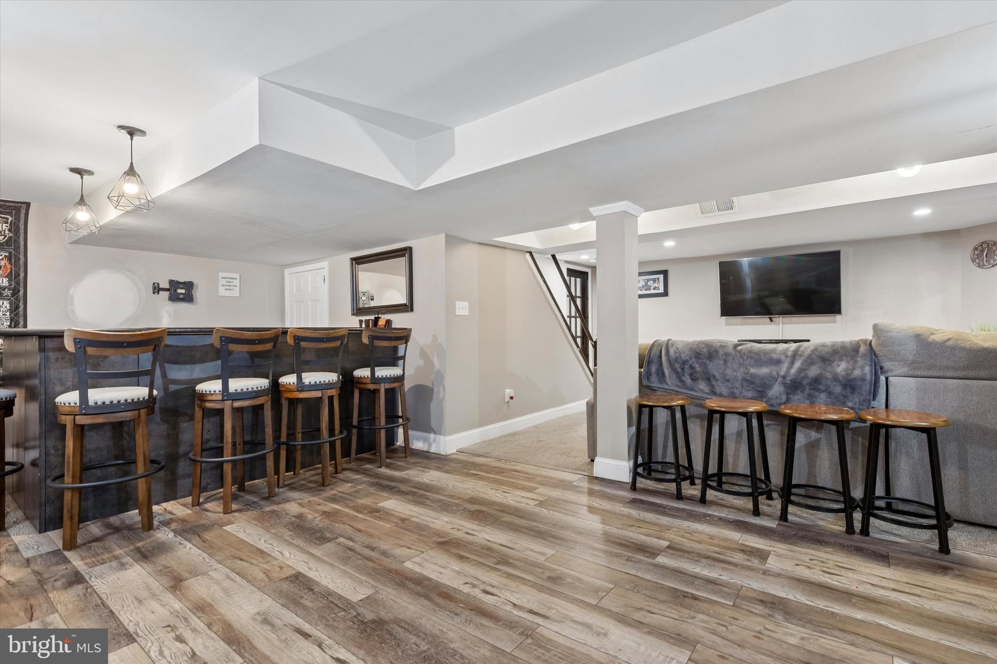 1126 Plowshare Road Blue Bell, PA 19422 - Photo 22 of 30 a view of a dining room with furniture and wooden floor