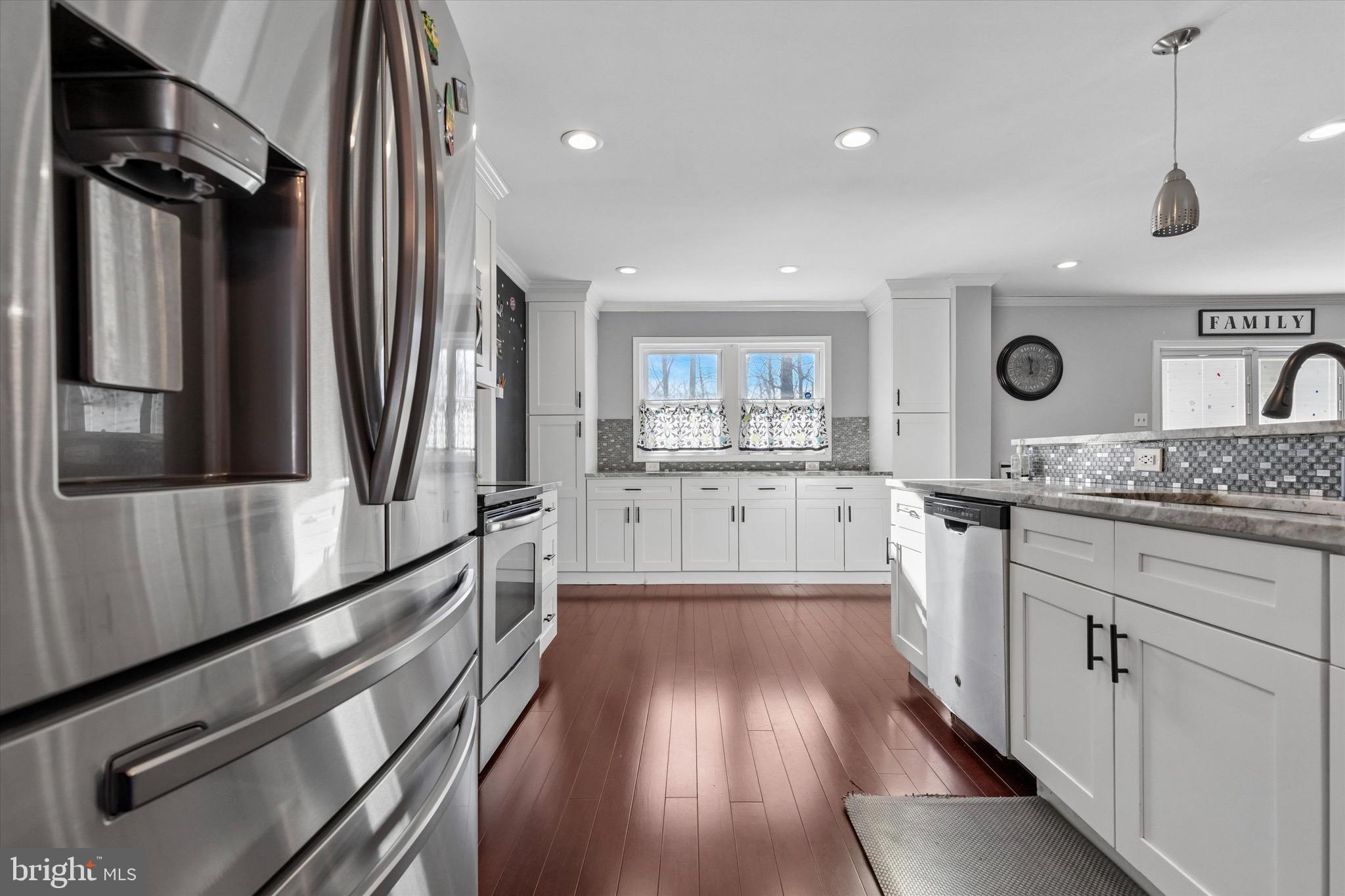 1126 Plowshare Road Blue Bell, PA 19422 - Photo 5 of 30 a kitchen with stainless steel appliances granite countertop a refrigerator and a sink