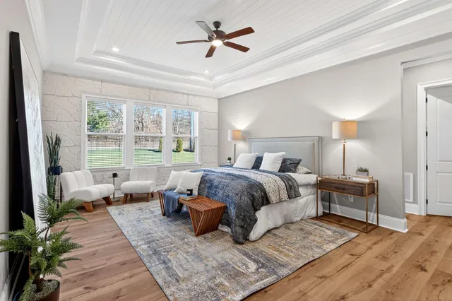 a bathroom with a sink and cabinets