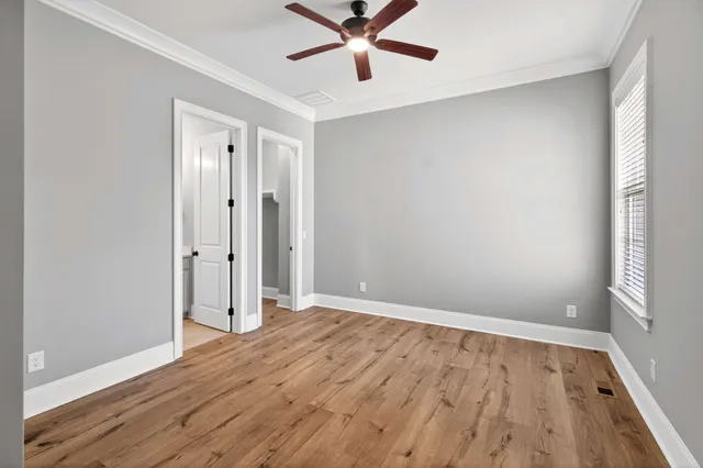 a view of work space with a ceiling fan