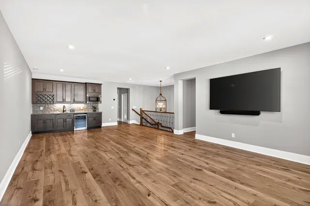a view of room with a ceiling fan