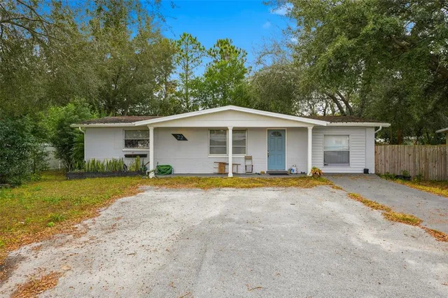 front view of a house with a yard