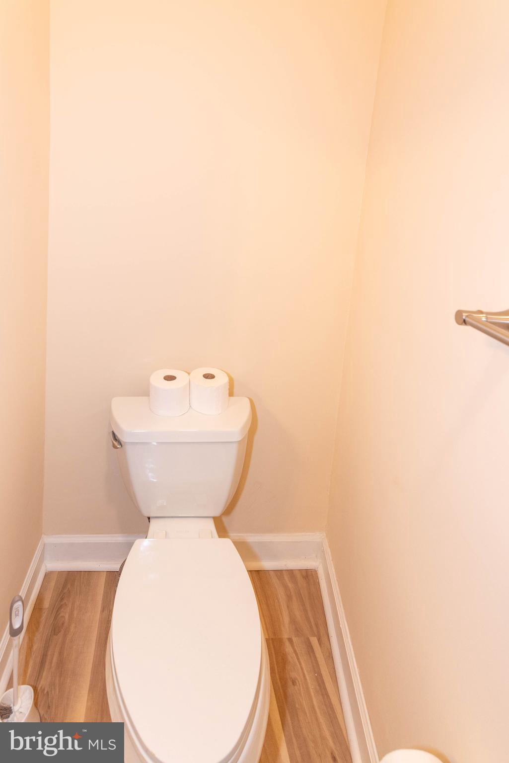 2000 Hollins Ferry Road Baltimore, MD 21230 - Photo 17 of 43 a bathroom with a toilet sink and mirror