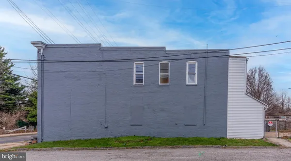 a front view of a house with garage