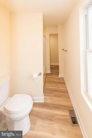 a bathroom with a tub and a shower