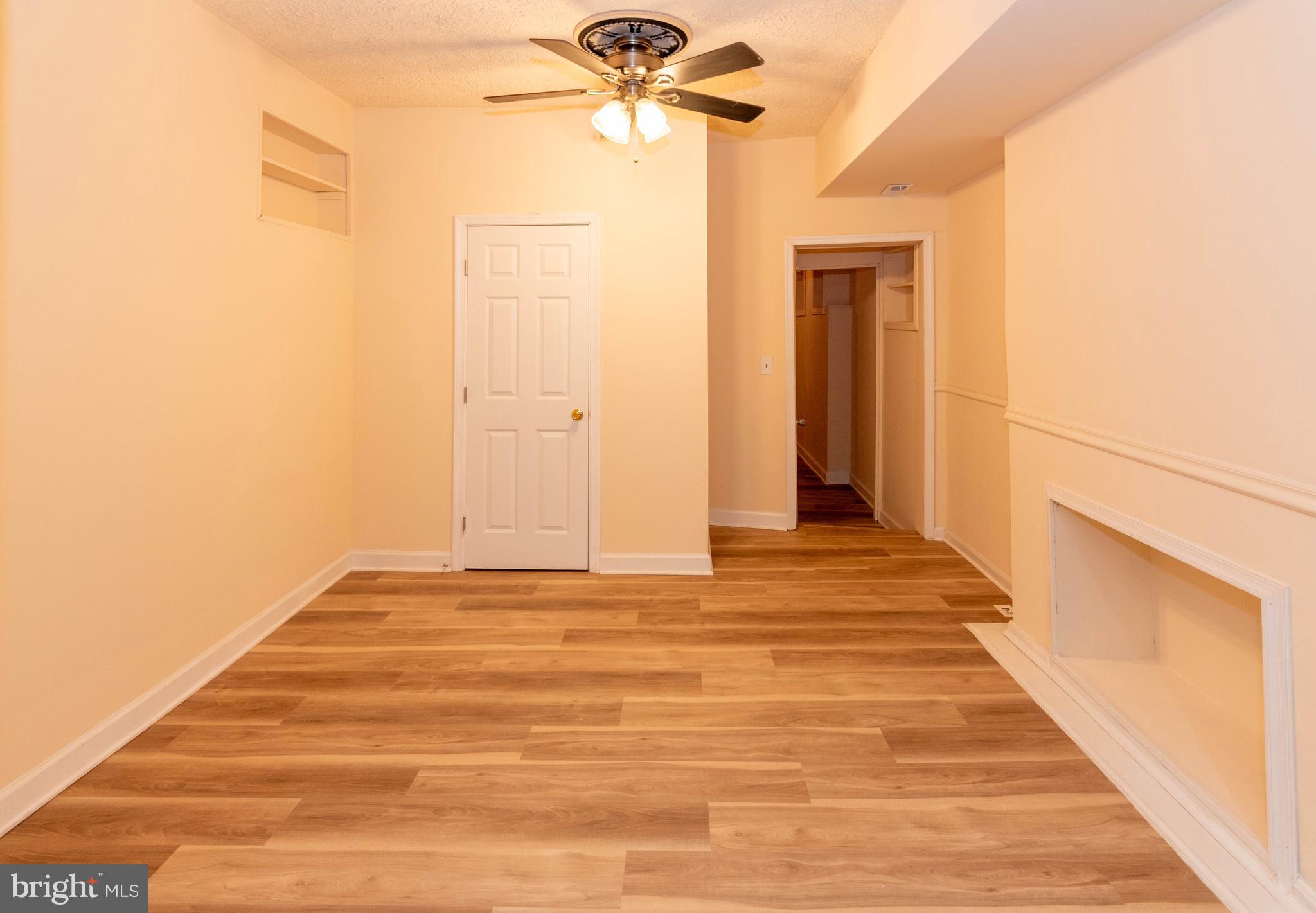 2000 Hollins Ferry Road Baltimore, MD 21230 - Photo 8 of 43 a view of a room with wooden floor