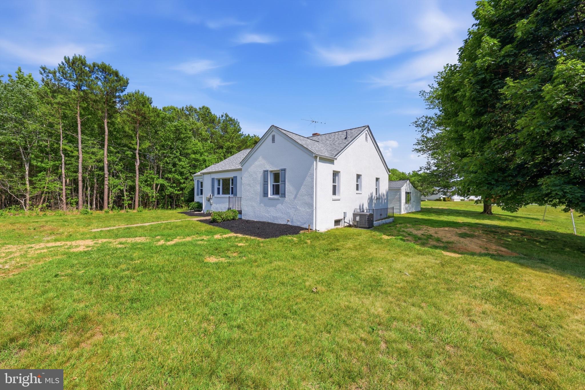 8251 Marshall Corner Road Pomfret, MD 20675 - Photo 2 of 20 Charming home nestled in nature's embrace.