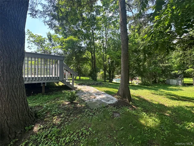 a view of backyard with green space