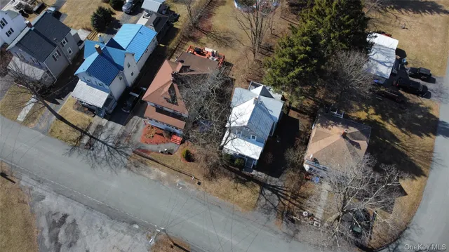 an aerial view of residential house with outdoor space