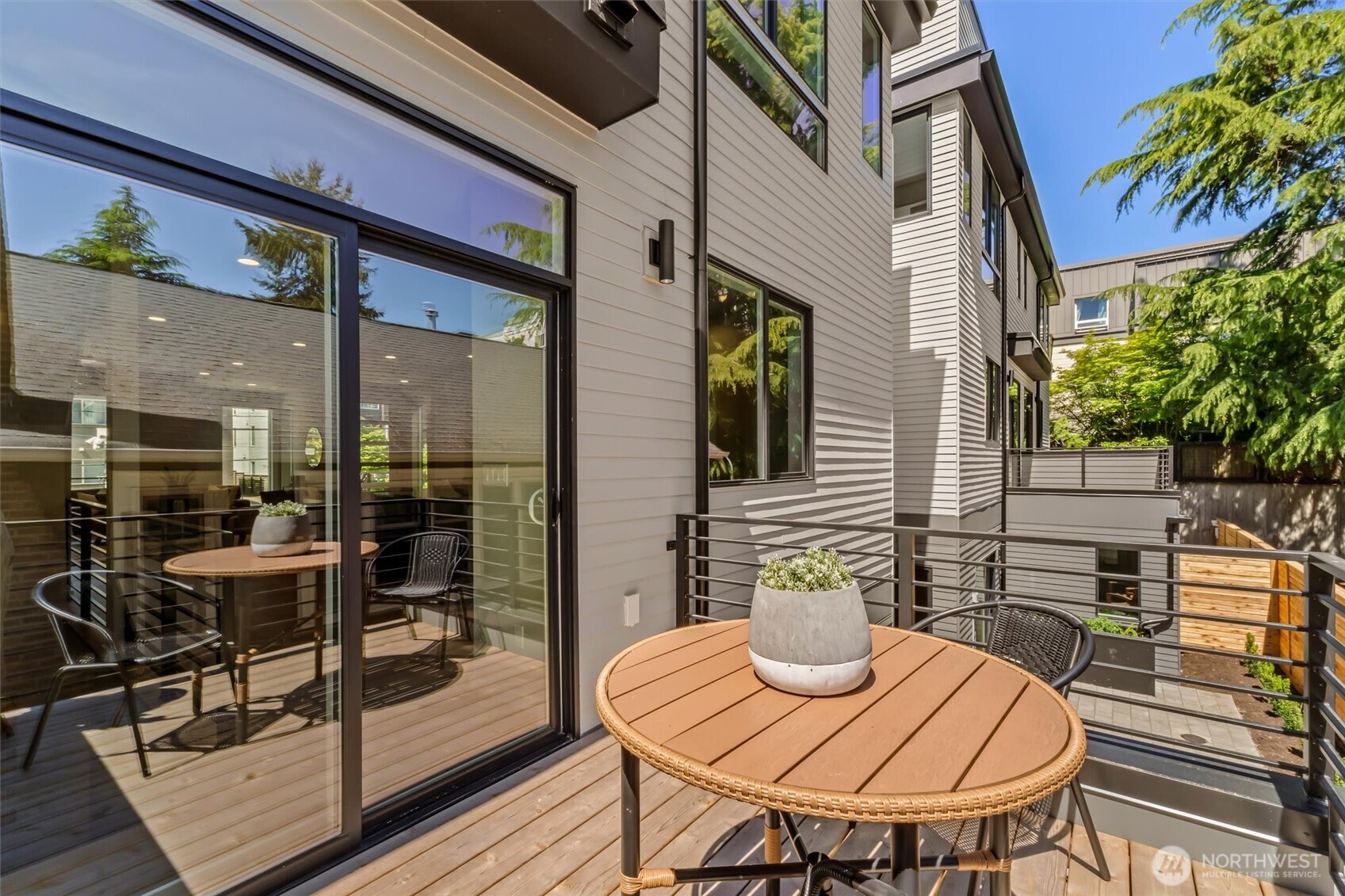 4460 Midvale Avenue North Seattle, WA 98103 - Photo 35 of 40 a view of a patio with a table and chairs