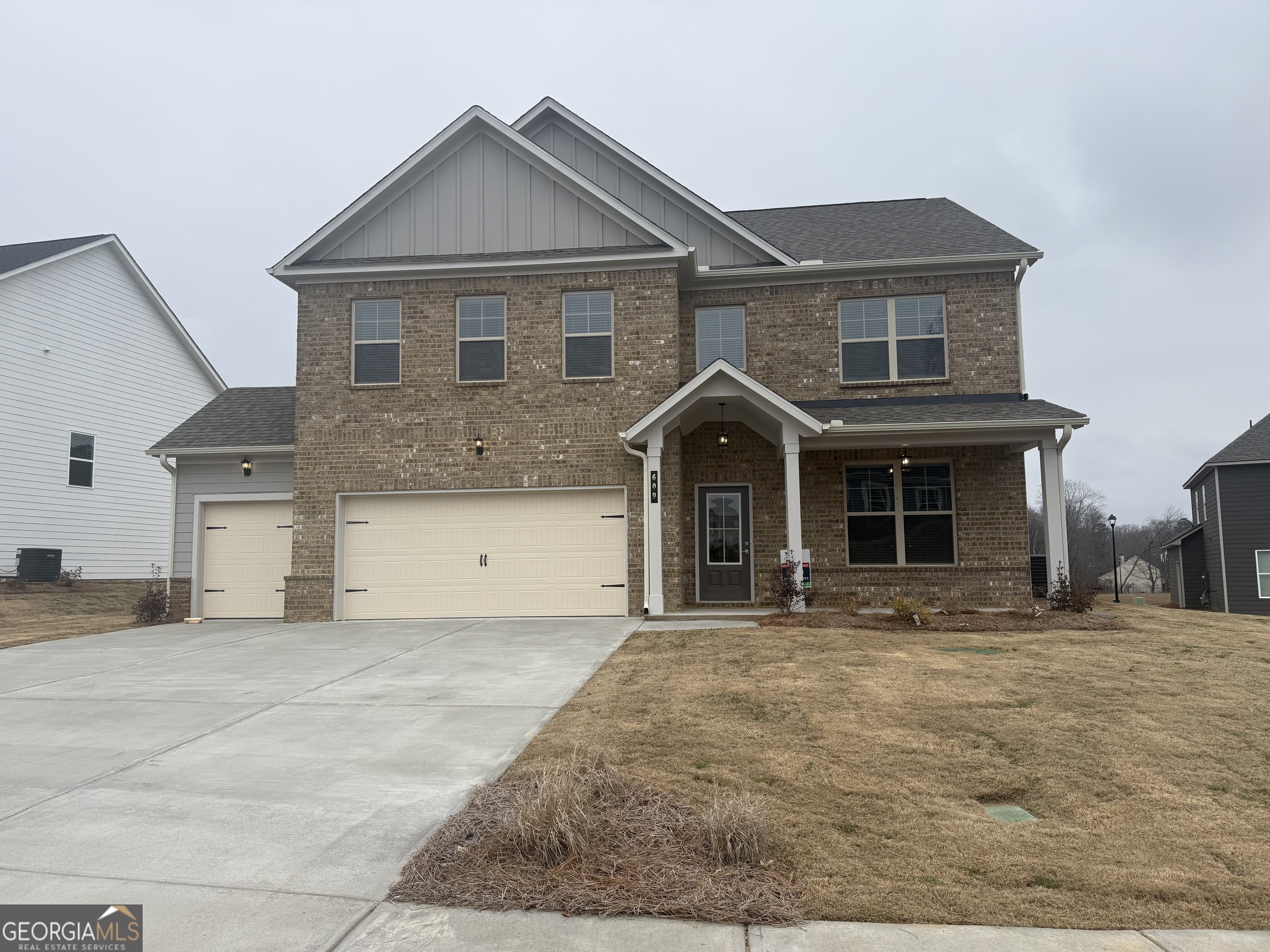 609 Villa Rica Springs Villa Rica, GA 30180 - Photo 3 of 9 a front view of a house with yard and parking space