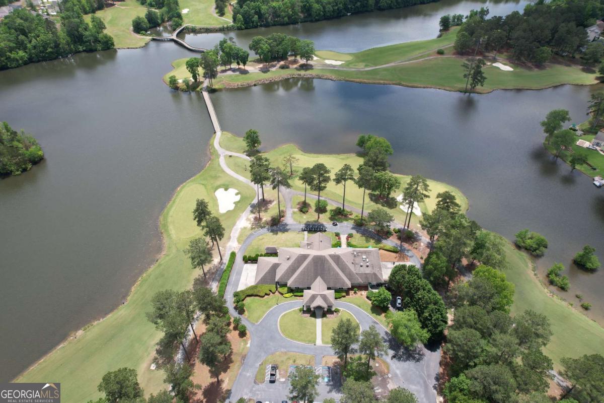 609 Villa Rica Springs Villa Rica, GA 30180 - Photo 7 of 9 an aerial view of a house with a yard and lake view