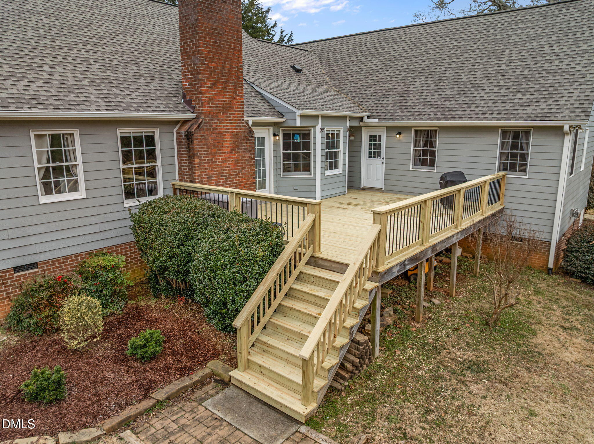 2008 Red Mountain Road Rougemont, NC 27572 - Photo 25 of 31 a front view of a house with wooden stairs