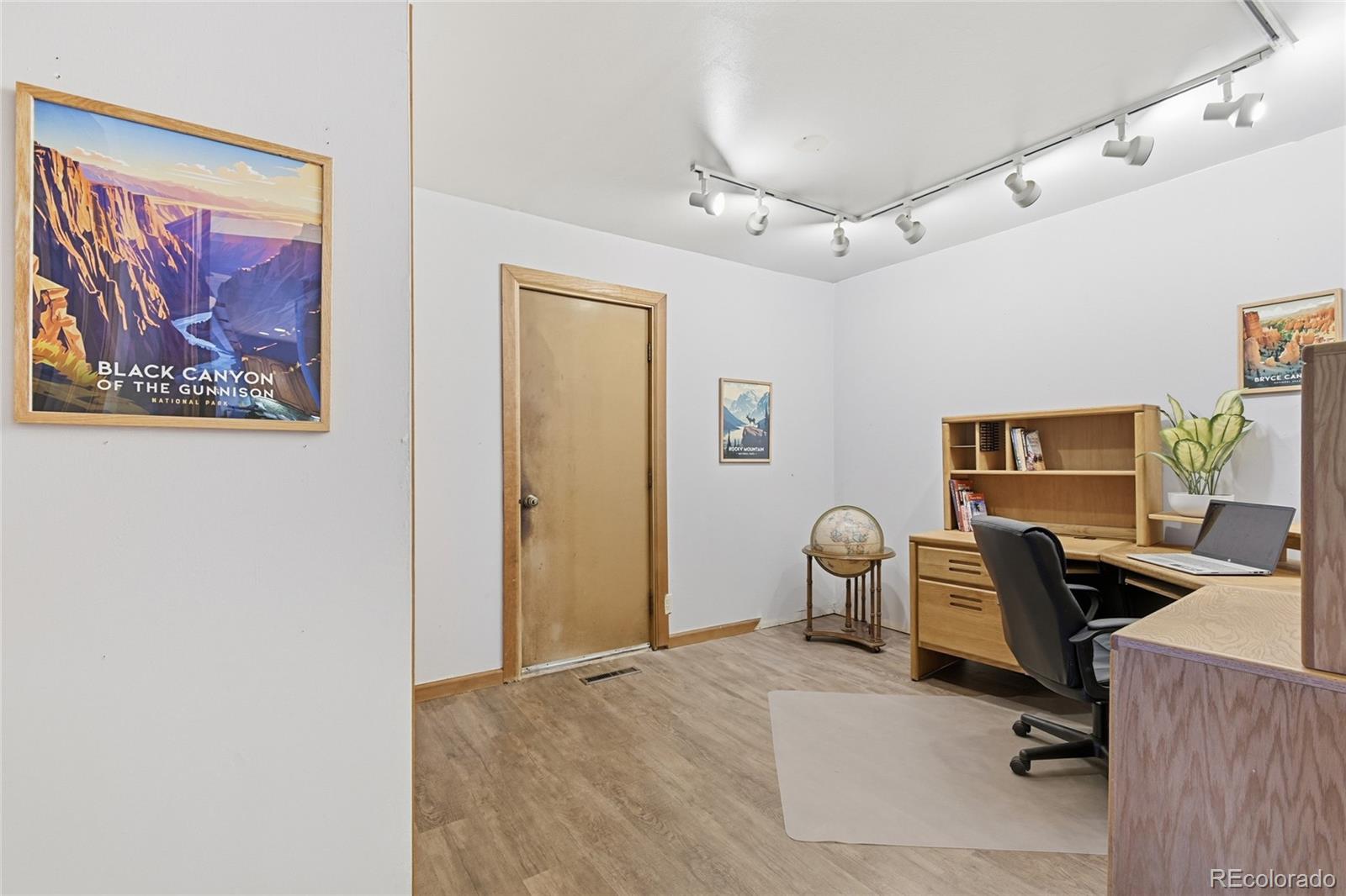 13082 South Wamblee Valley Road Conifer, CO 80433 - Photo 18 of 35 a view of a workspace with furniture and a window