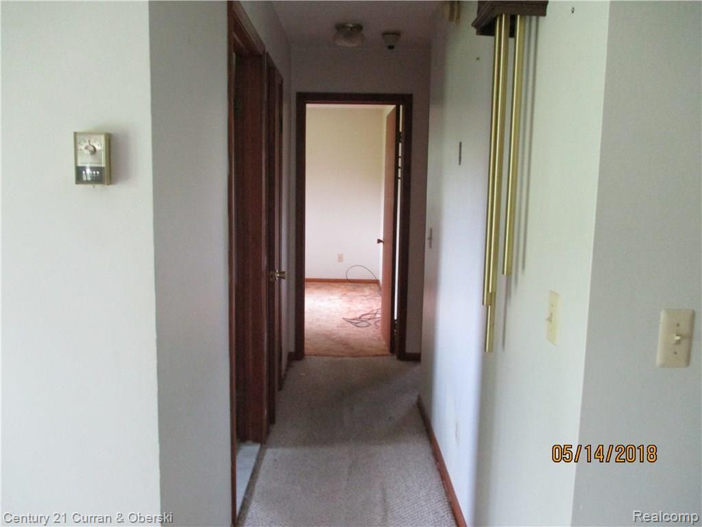 18480 Merriman Road Romulus, MI 48174 - Photo 16 of 30 HALL TO BEDROOMS AND BATH