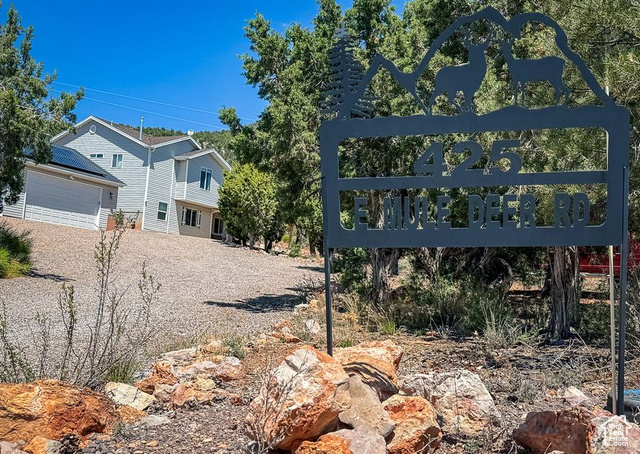 425 East Mule Deer Road Central, UT 84722 - Photo 43 of 72 Community sign with gravel driveway