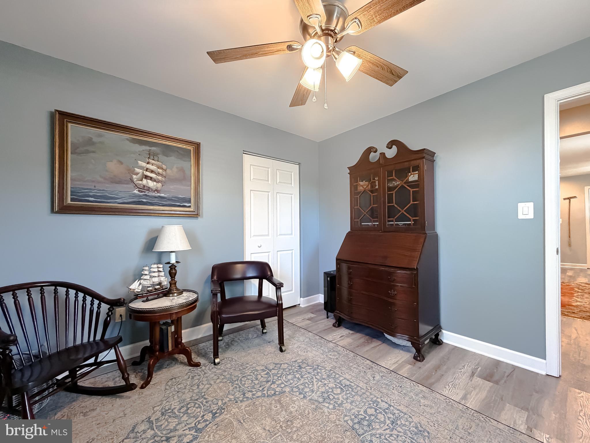 4985 Solomons Island Road Huntingtown, MD 20639 - Photo 14 of 50 a living room with furniture and a window