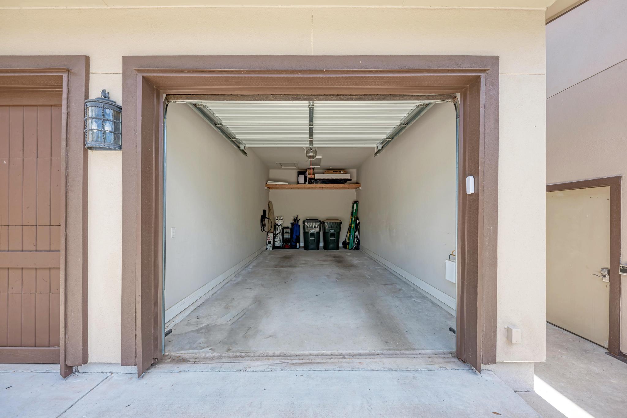 2601 North Quinlan Park Road, Unit 506 Austin, TX 78732 - Photo 34 of 39 A spacious garage provides ample room for parking and storage needs.