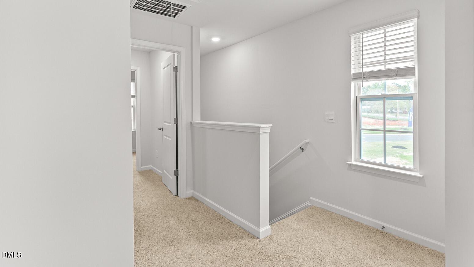 186 Canopy Drive Graham, NC 27253 - Photo 12 of 23 an empty room with windows and closet