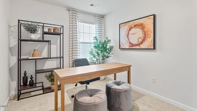 a bedroom with a bed and dresser