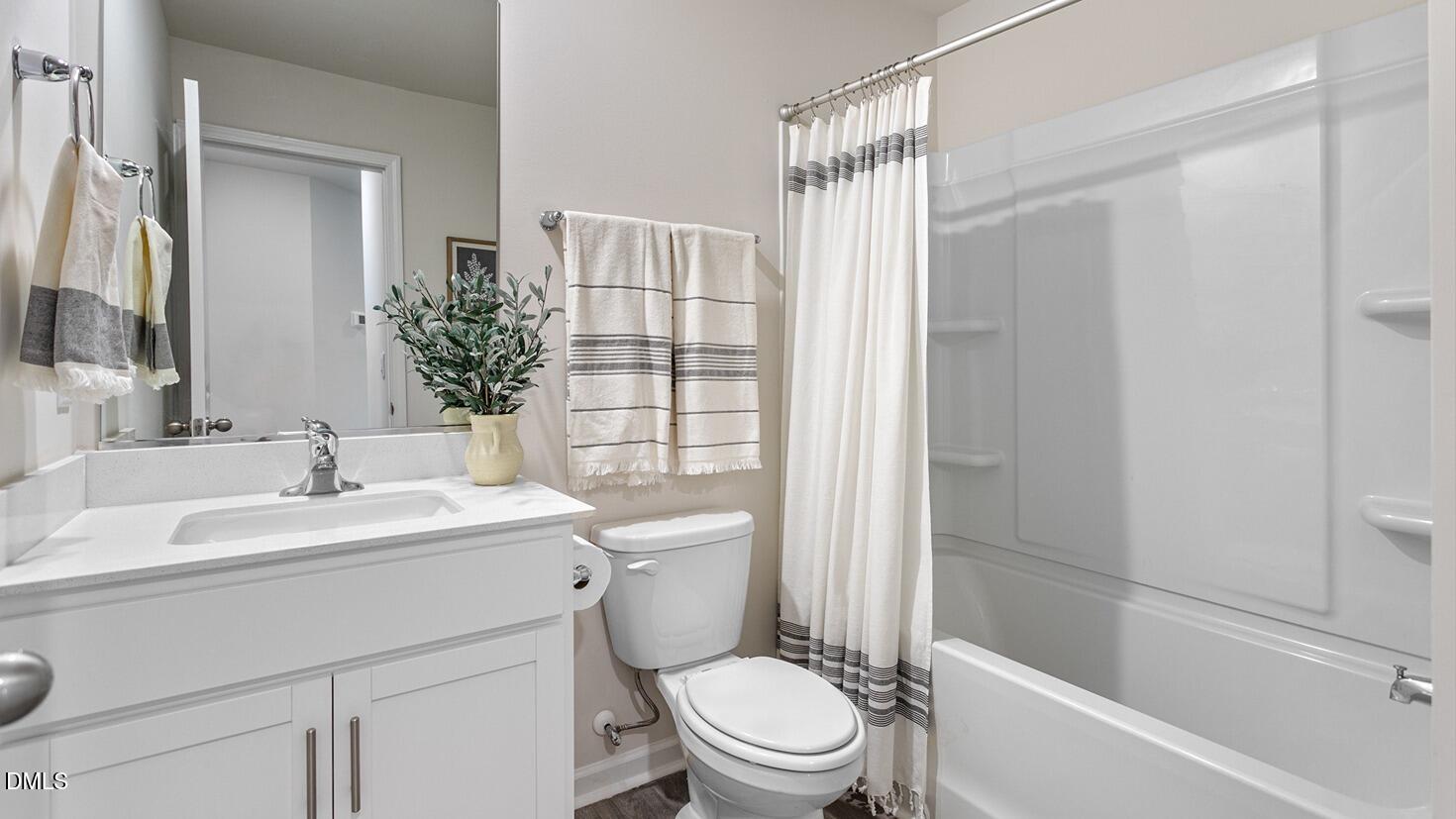 186 Canopy Drive Graham, NC 27253 - Photo 20 of 23 a bathroom with a sink toilet and shower