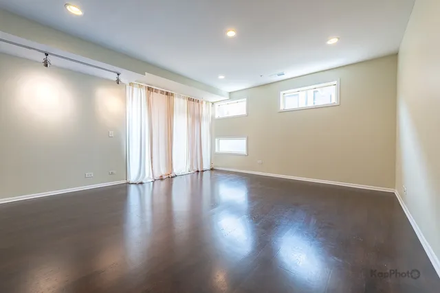 a view of dining room with furniture and wooden floor