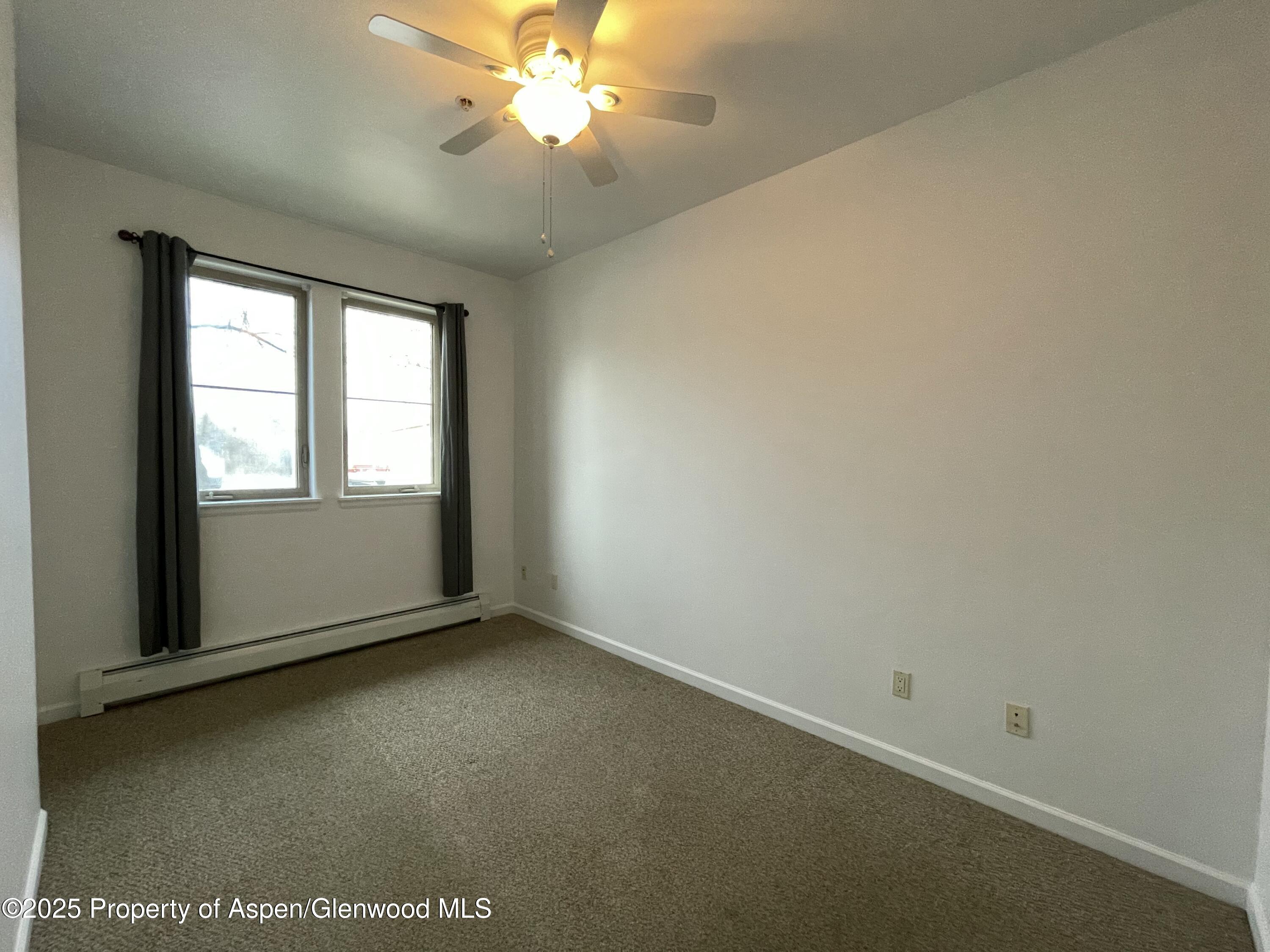 712 Lakeside Drive Basalt, CO 81621 - Photo 11 of 21 an empty room with a window