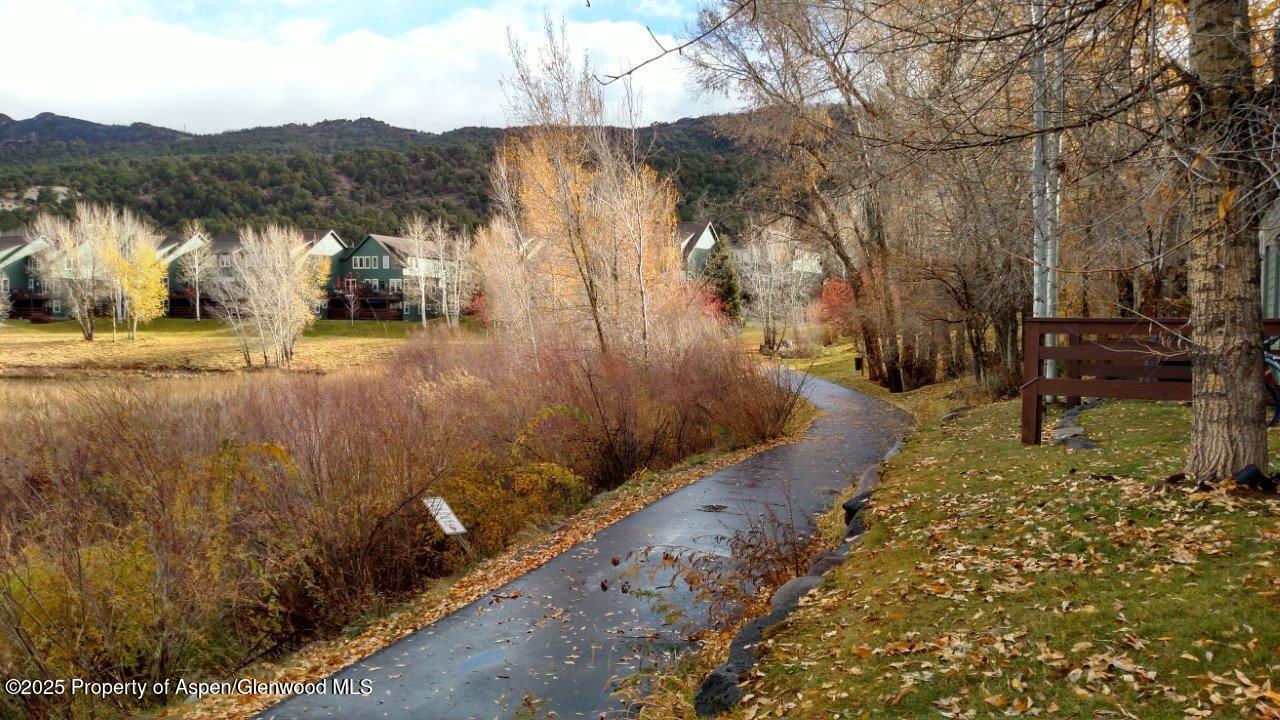 712 Lakeside Drive Basalt, CO 81621 - Photo 19 of 21 a view of a yard with wooden fence
