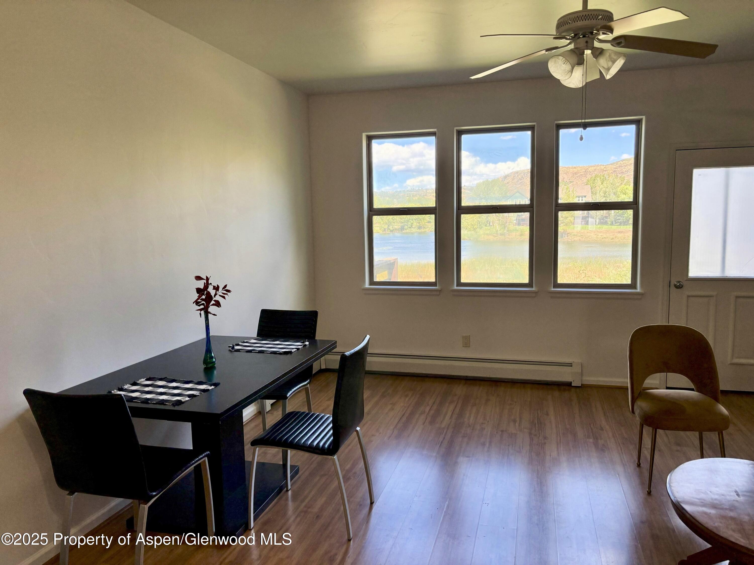 712 Lakeside Drive Basalt, CO 81621 - Photo 3 of 21 a room with wooden floor and a window