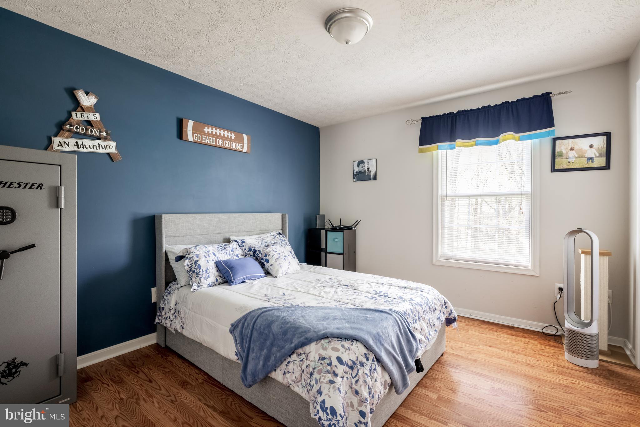 143 Club House Road Front Royal, VA 22630 - Photo 21 of 38 a bedroom with a bed and a window